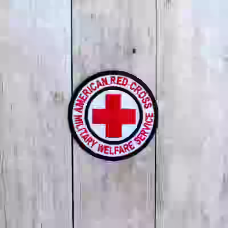 United States Women Army Corps Red Cross Badge United States Women Army Corps Red Cross Badge – Premium Replica, made of Red lettering and cross emblem on white wool background