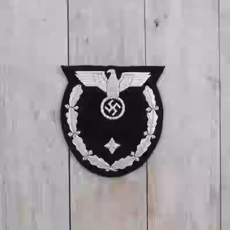 NSDAP Diplomatic Sleeve Eagle (1939-1945) NSDAP Diplomatic Sleeve Eagle (1939-1945) – Premium Replica, made of Silver embroidery on black wool background