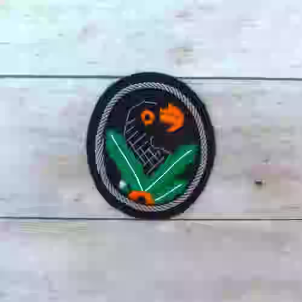 Second Class Sniper Badge with Silver Trim Second Class Sniper Badge with Silver Trim – Premium Replica, made of Silver cord trim with embroidered eagle on fabric base
