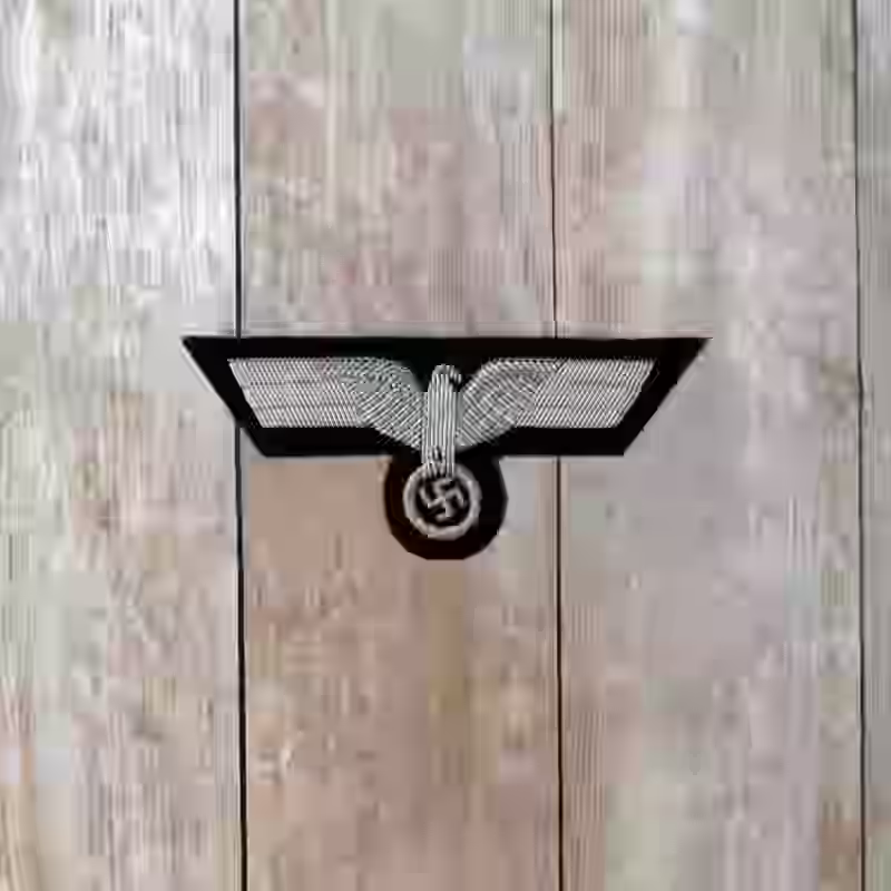Panzer Officer's Hand Embroidered Silver Breast Eagle Panzer Officer's Hand Embroidered Silver Breast Eagle – Premium Replica, made of Silver aluminum thread embroidery on black wool background