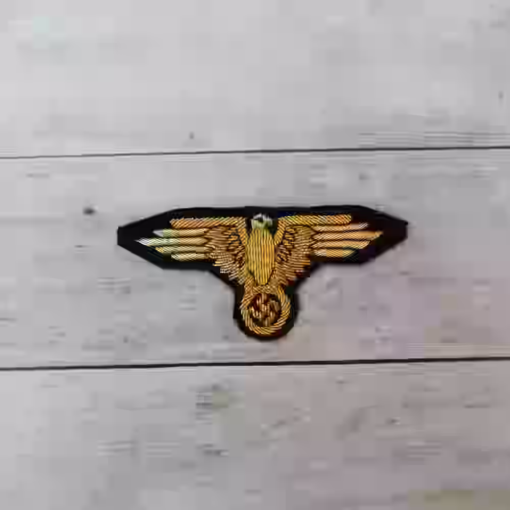 Waffen SS Sepp Dietrich Oberstgruppenführer Hand Embroidered Arm Eagle Waffen SS Sepp Dietrich Oberstgruppenführer Hand Embroidered Arm Eagle – Premium Replica, made of Hand-embroidered gold aluminum wire eagle on black wool background