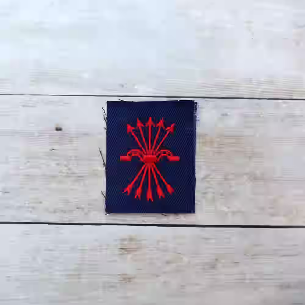Spanish Blue Division Enlisted Men's Falangist Breast Patch Spanish Blue Division Enlisted Men's Falangist Breast Patch – Premium Replica, made of Machine-embroidered red cotton thread on black cotton background