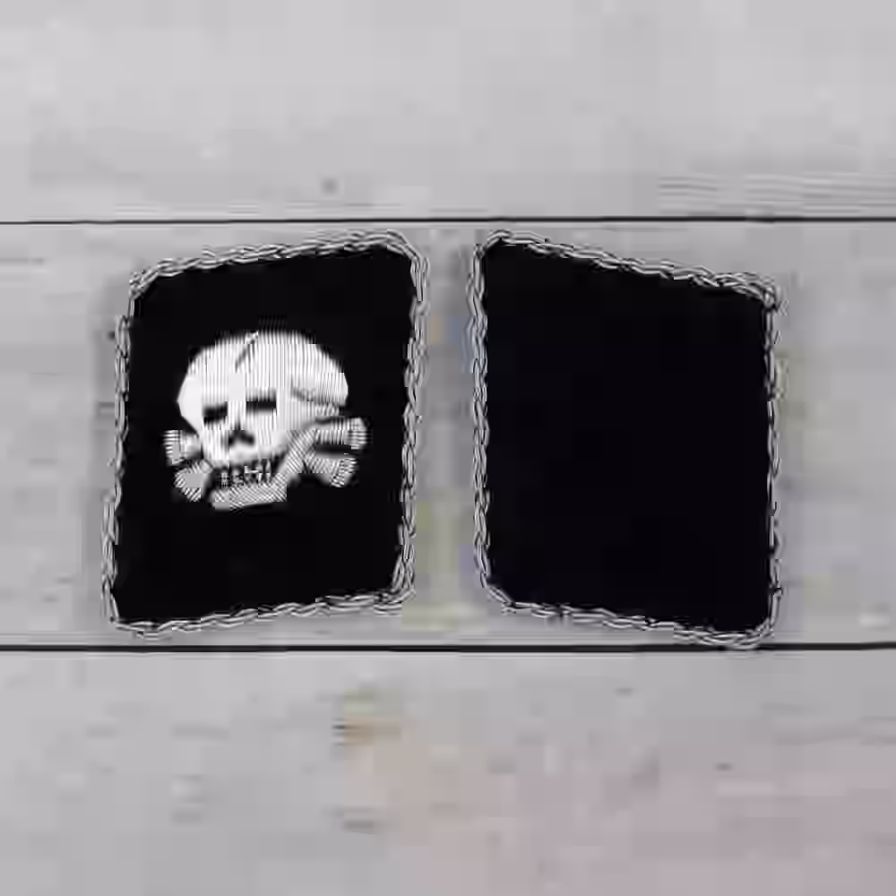 Waffen-SS Totenkopf Officer's Collar Tabs Waffen-SS Totenkopf Officer's Collar Tabs – Premium Replica, made of Handmade silver thread on black wool background