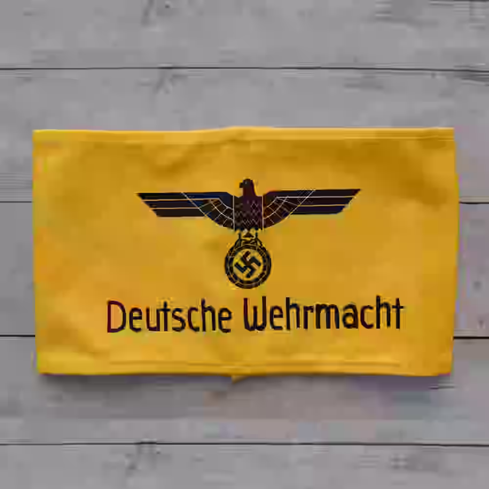 Deutsches Wehrmacht Armband Deutsches Wehrmacht Armband – Premium Replica, made of Machine-embroidered black lettering on yellow wool background