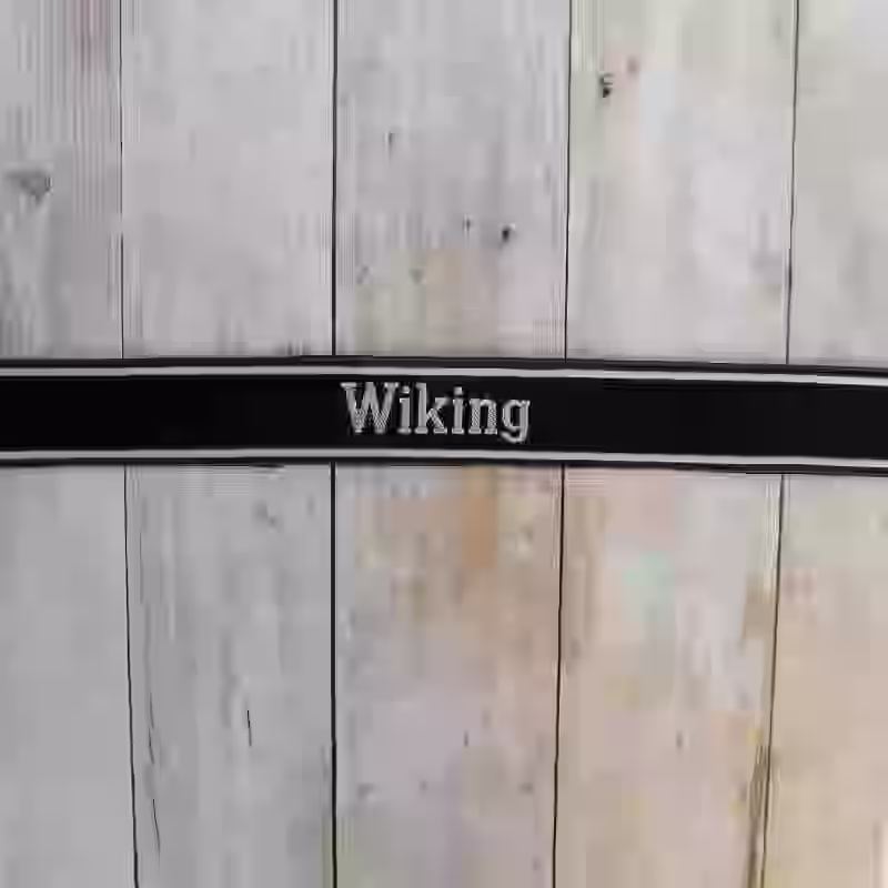 Wiking EM Cuff Title Wiking EM Cuff Title – Premium Replica, made of Black woven silk with hand-embroidered grey thread