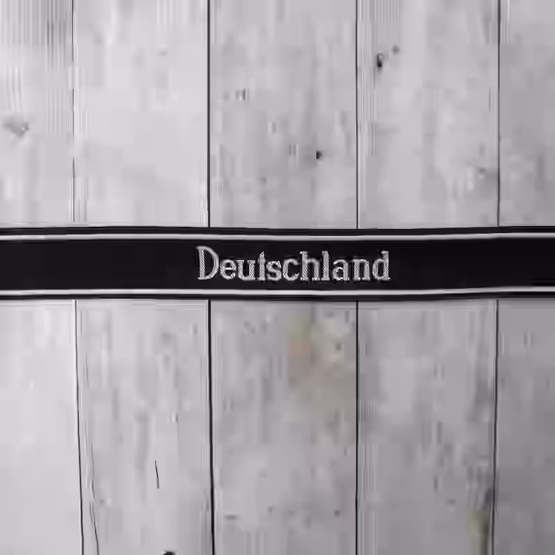 Deutschland EM Cuff Title Deutschland EM Cuff Title – Premium Replica, made of Black woven silk with hand-embroidered grey thread and reinforced border