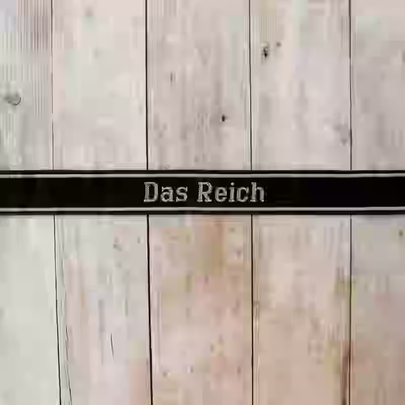 Das Reich EM Cuff Title Das Reich EM Cuff Title – Premium Replica, made of Black woven silk with hand-embroidered grey thread and reinforced border