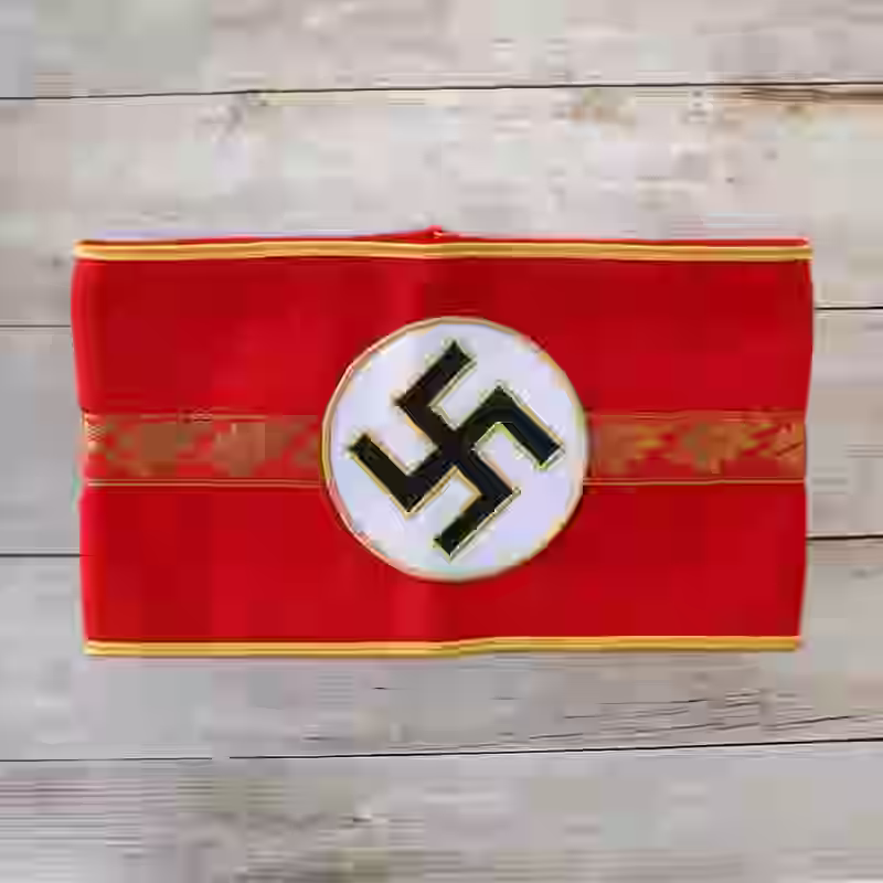 NSDAP Ortsgruppenleiter Armband NSDAP Ortsgruppenleiter Armband – Premium Replica, made of Red wool with gold thread oak leaves