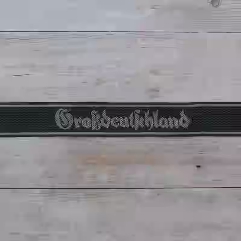 Grossdeutschland Division Cuff Title Grossdeutschland Division Cuff Title – Premium Replica, made of Darkgreen silk background with grey thread lettering